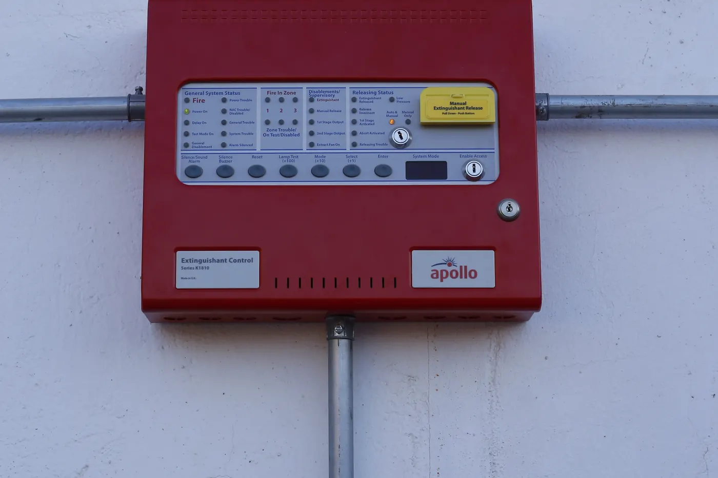 Fire alarm and extinguishing control panel on a wall