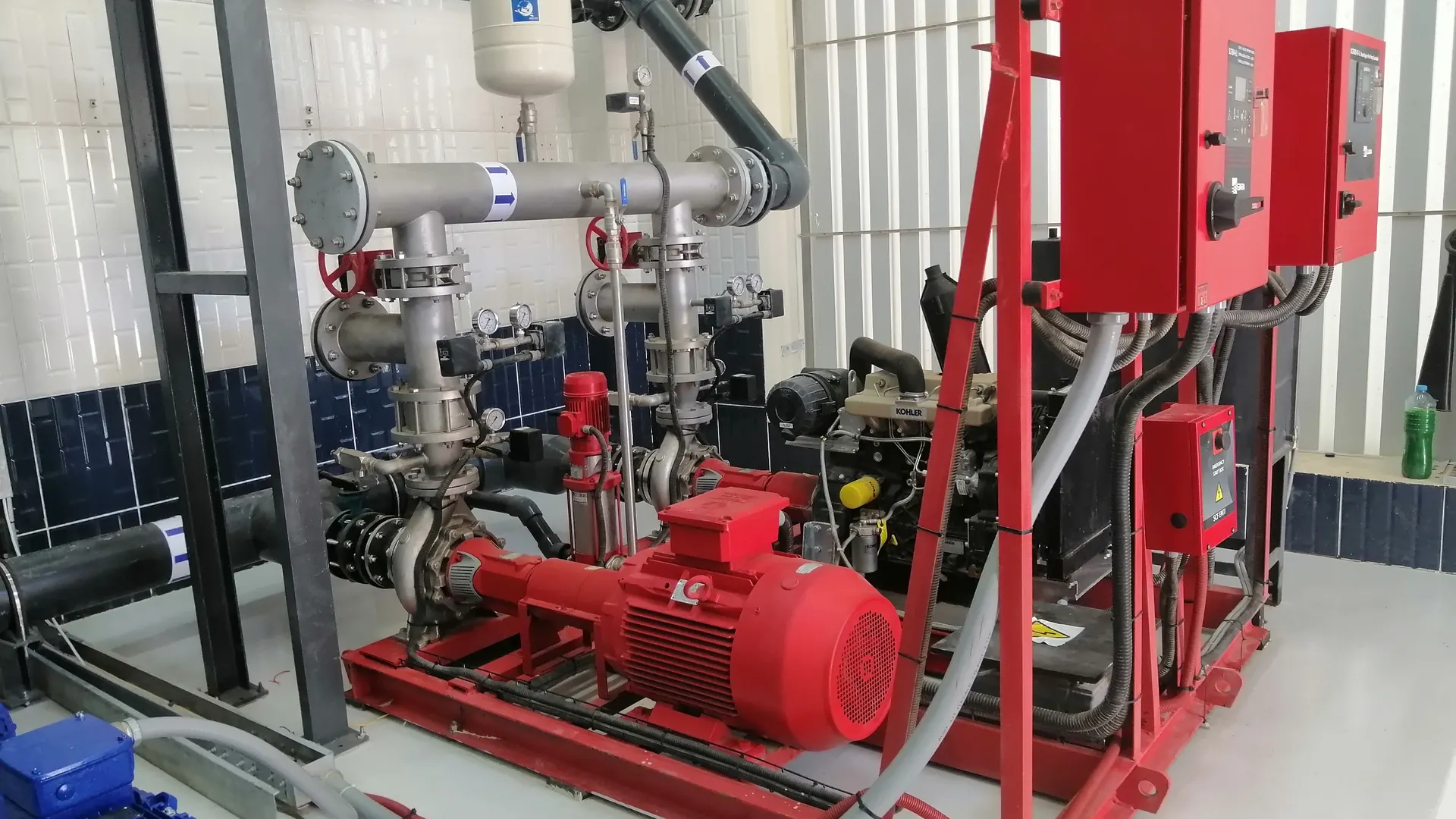 Diesel and electric fire pumps in a pump room installed by SESCO